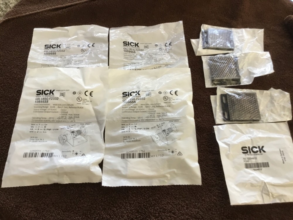 4 sick grl18sg-f2332 sensors new In package including D-79183 reflectors