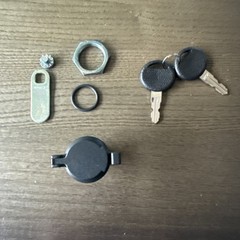 UNDERCOVER SWING CASE LOCK ASSEMBLY KIT, NEW LOCK, RETAINER NUT, O-RING, 2 KEYS