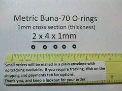 2mm ID x 4mm OD x 1mm thick O-ring. Buna-70. Quan 5..